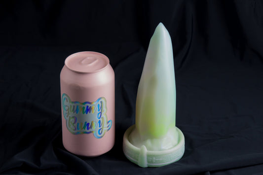 Medium Bloomstone in glow in the dark white quartz color, soft firmness, with suction cup base