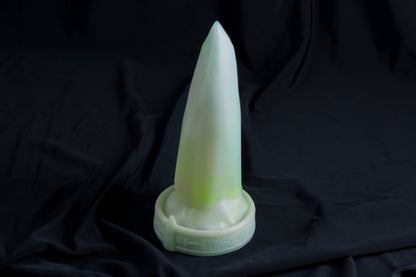 Medium Bloomstone in glow in the dark white quartz color, soft firmness, with suction cup base