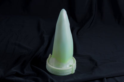Medium Bloomstone in glow in the dark white quartz color, soft firmness, with suction cup base