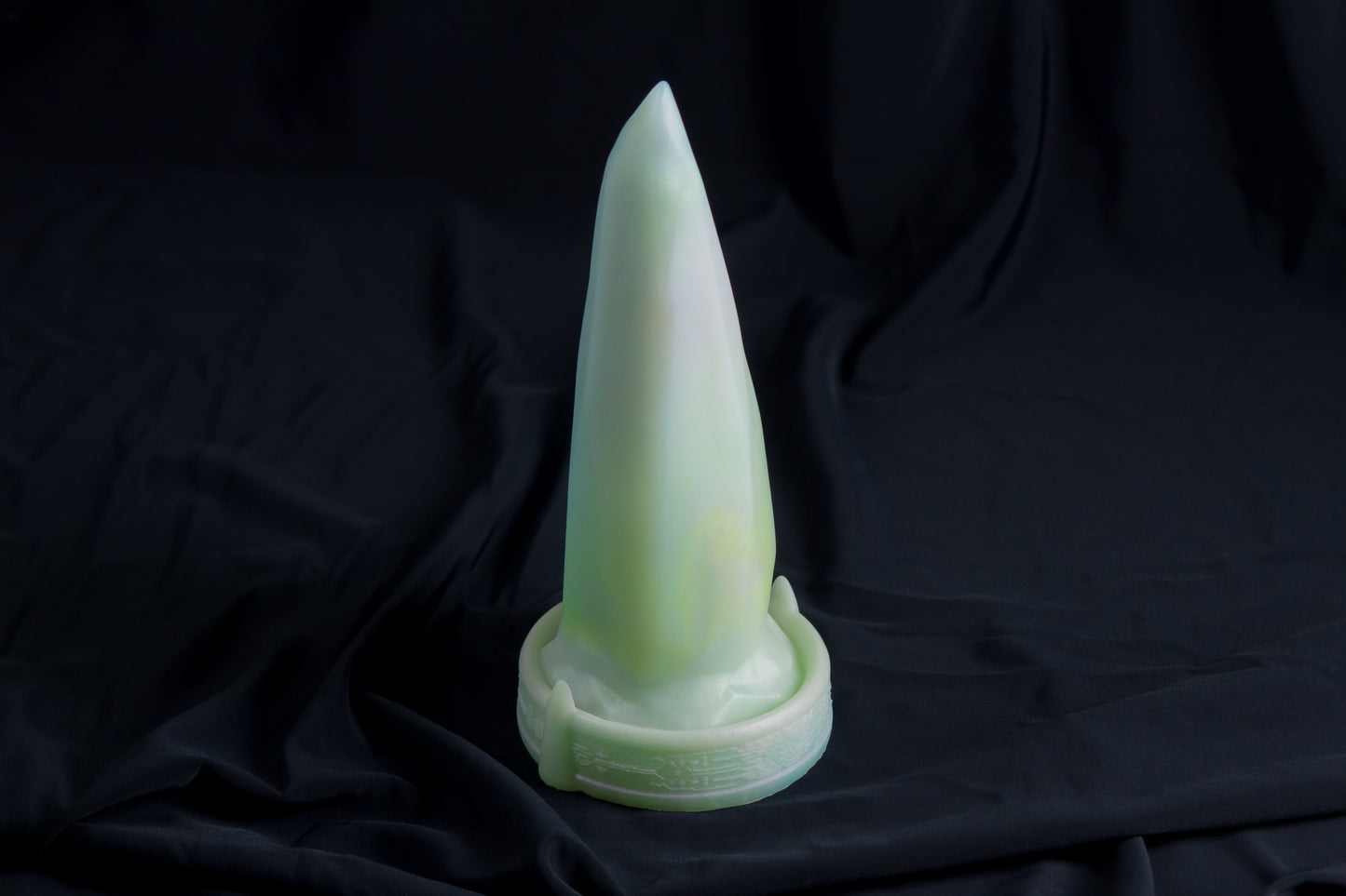 Medium Bloomstone in glow in the dark white quartz color, soft firmness, with suction cup base