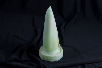 Medium Bloomstone in glow in the dark white quartz color, soft firmness, with suction cup base