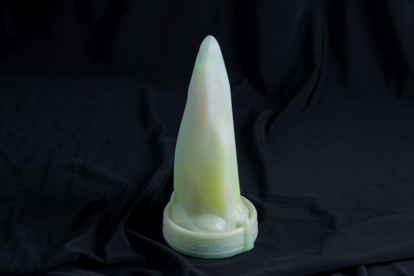 Medium Bloomstone in glow in the dark white quartz color, soft firmness, with suction cup base