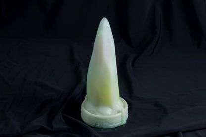 Medium Bloomstone in glow in the dark white quartz color, soft firmness, with suction cup base