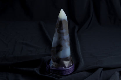 Medium Bloomstone in glow in the dark black marble color, soft firmness, with suction cup base