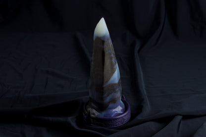 Medium Bloomstone in glow in the dark black marble color, soft firmness, with suction cup base