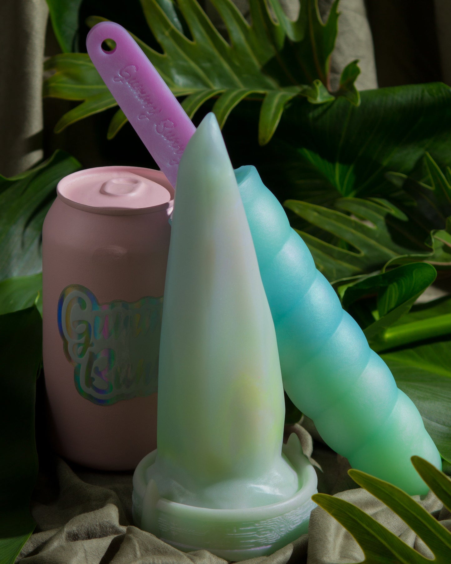 Medium Bloomstone in glow in the dark white quartz color, soft firmness, with suction cup base